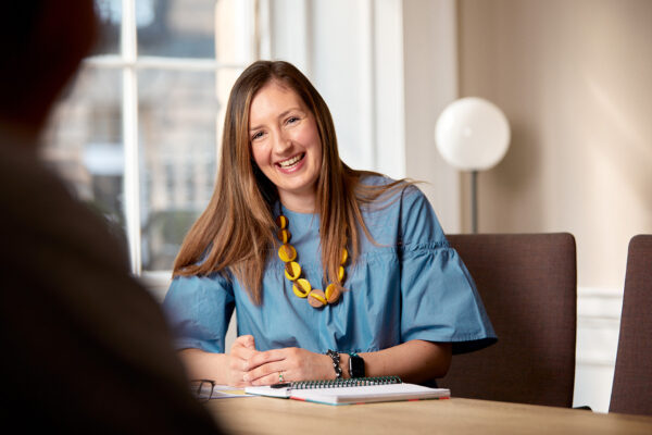 Image of woman in blue shirt