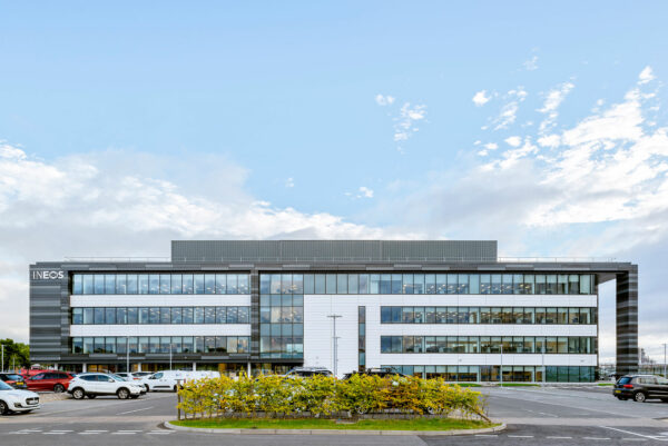 INEOS HQ outer building displaying 4 floors with large glass partitions.